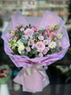 Bouquet con rose color lavanda e rosa cipria, lisianthus e alstroemeria