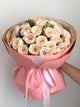 Bouquet premium delicato di rose pesca e rosa