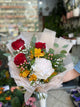 Refined Bouquet with Red Roses, a White Peony, and Yellow Flowers